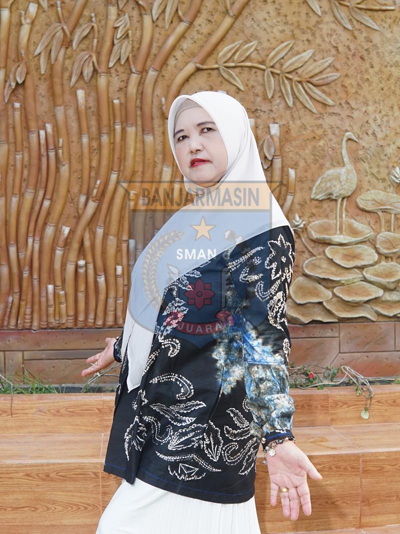 Profil Hj. Helyati, S.Pd